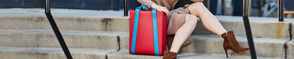 Redefine work and off-work rules with the Kora tote. Designed for smart wearability and bold impact, the Kora's daring color contrasts and sharp silhouette set you apart from the same old perspectives.