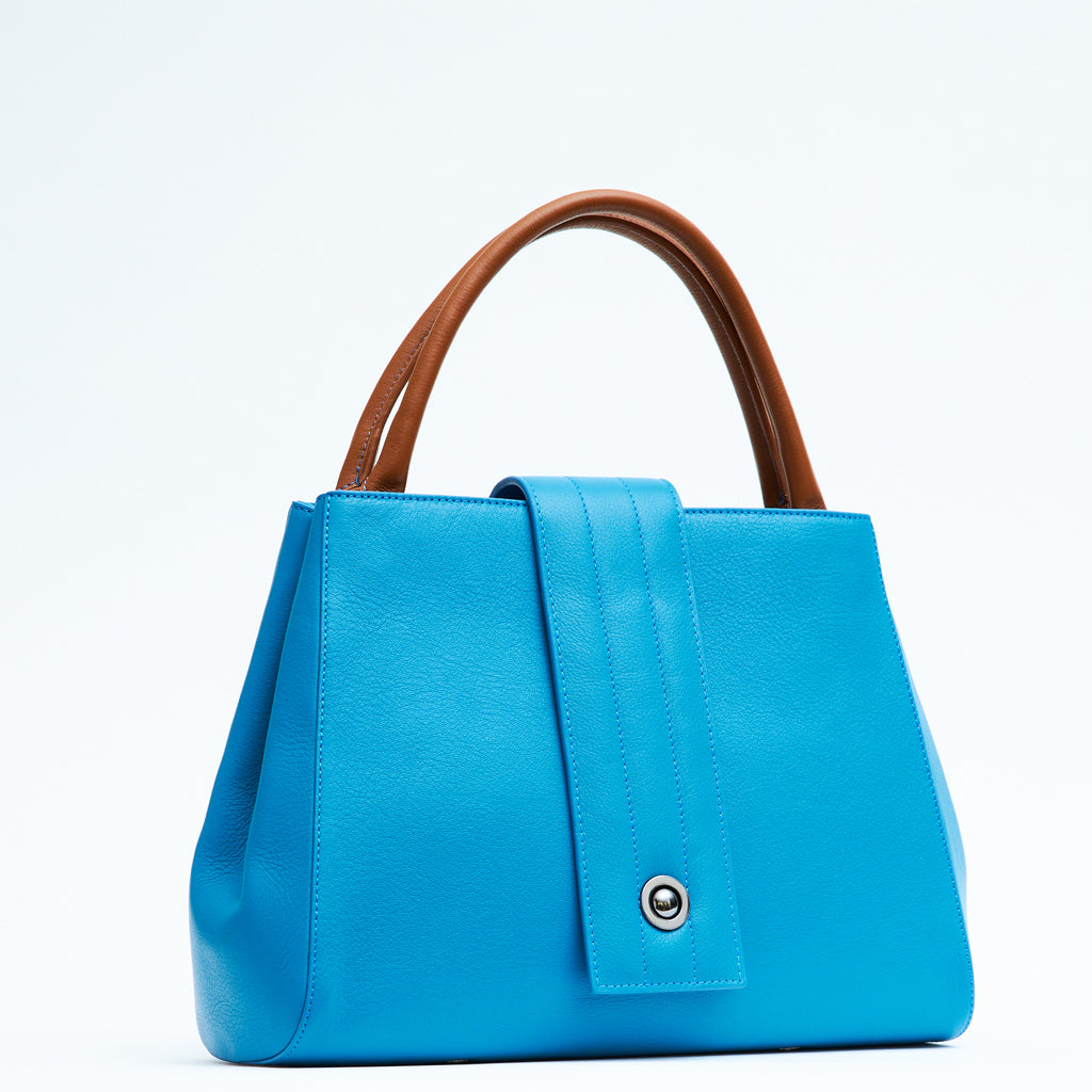 Designer turquoise blue leather handbag, women interchangeable leather bag, turquoise blue leather purse, women work bags, minimalist fashion bag, Fall and Winter bags, Fall 2025 fashion, designer shoulder bag, women's new handbags, Tomoli Briffani Lean handbag in sky blue