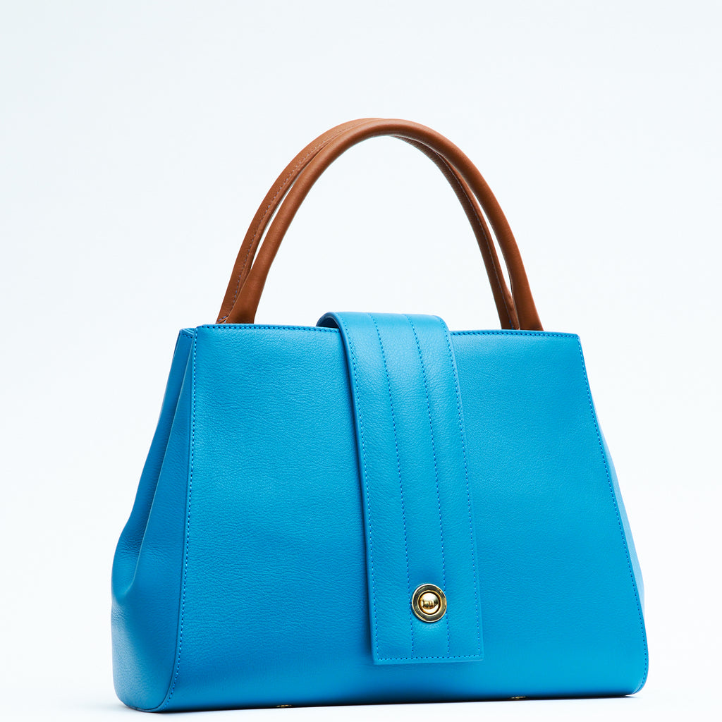Designer turquoise blue leather handbag, women interchangeable leather bag, turquoise blue leather purse, women work bags, minimalist fashion bag, Fall and Winter bags, Fall 2025 fashion, designer shoulder bag, women's new handbags, Tomoli Briffani Lean handbag in sky blue